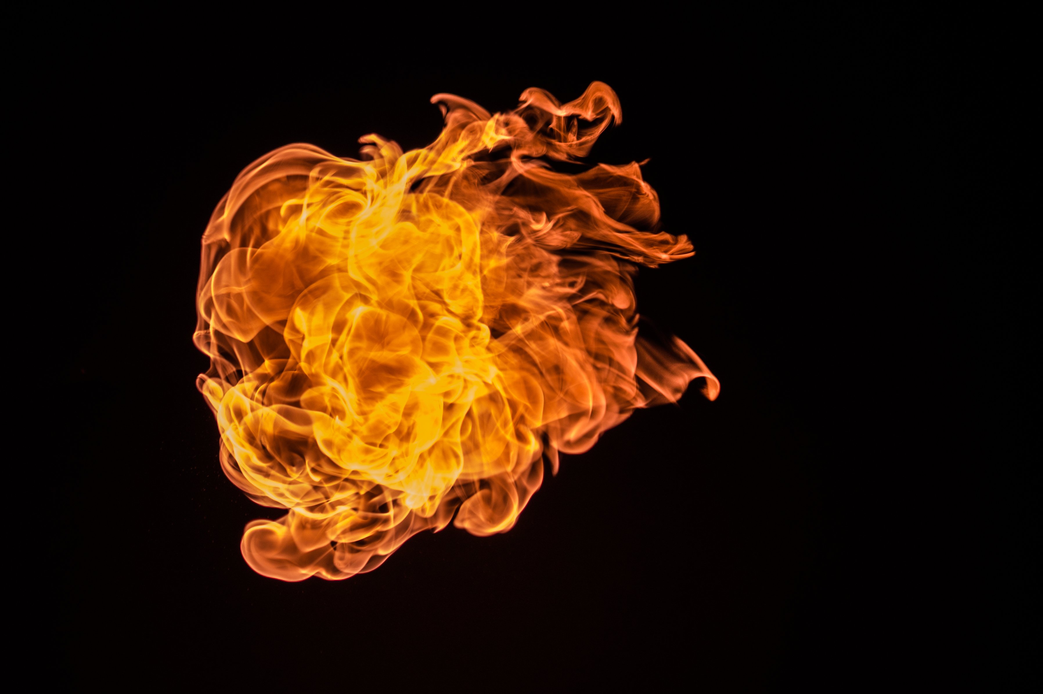 Canva - Red Fire With Black Background